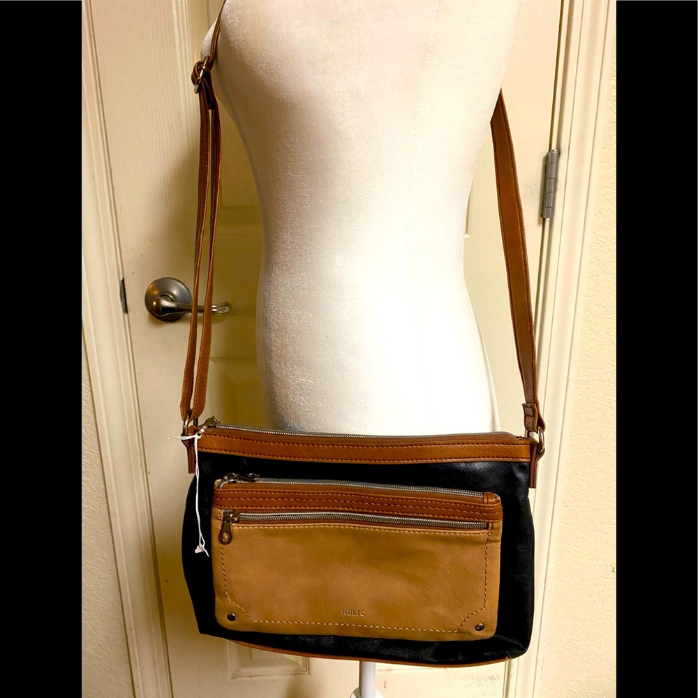 Relic w/Adjustable Strap 2 Exterior & Main Zippered Compartments